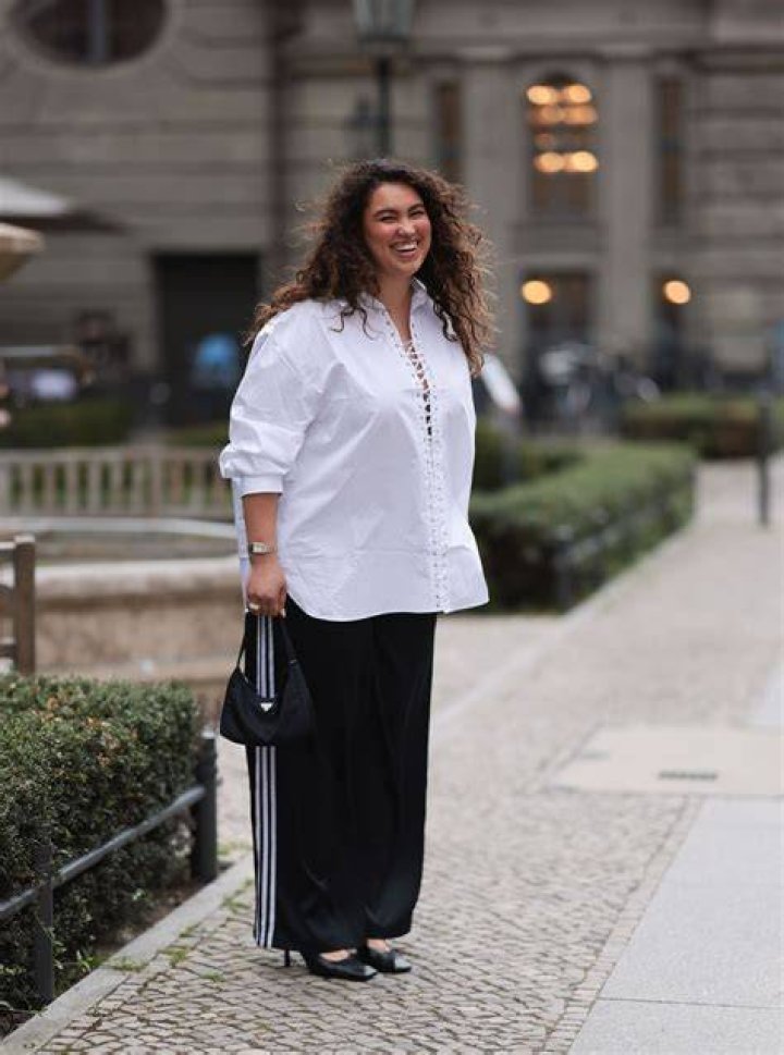 BERLIN, GERMANY - APRIL 22: Nadja Ali drinking a juice and wearing a beige Celine trench coat, a ripped denim jeans, a black top, black Celine sunglasses, black Saint Laurent heels on April 22, 2016 in Berlin, Germany. (Photo by Christian Vierig/Getty Images)