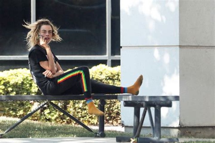 cara delevingne acting erratically outside airport