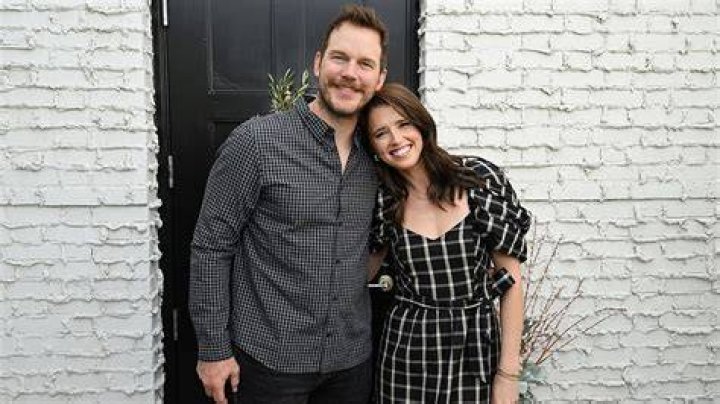 Chris Pratt in a black suit.