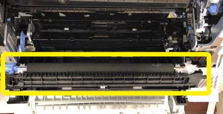 Clean the printer fuser roller if your laser printer is printing shadows