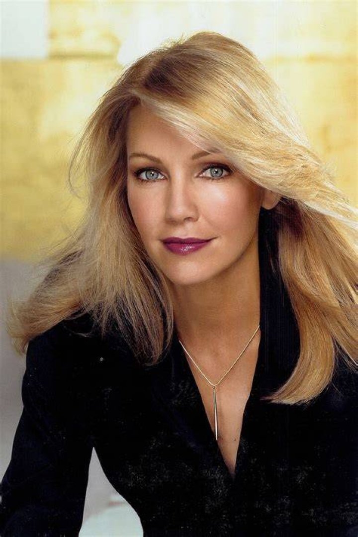 Heather Locklear smiling in a candid photo