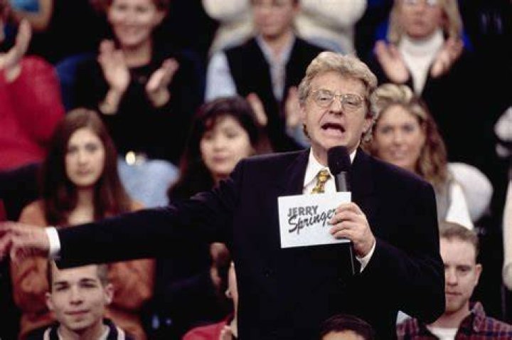 Jerry Springer laughing with audience