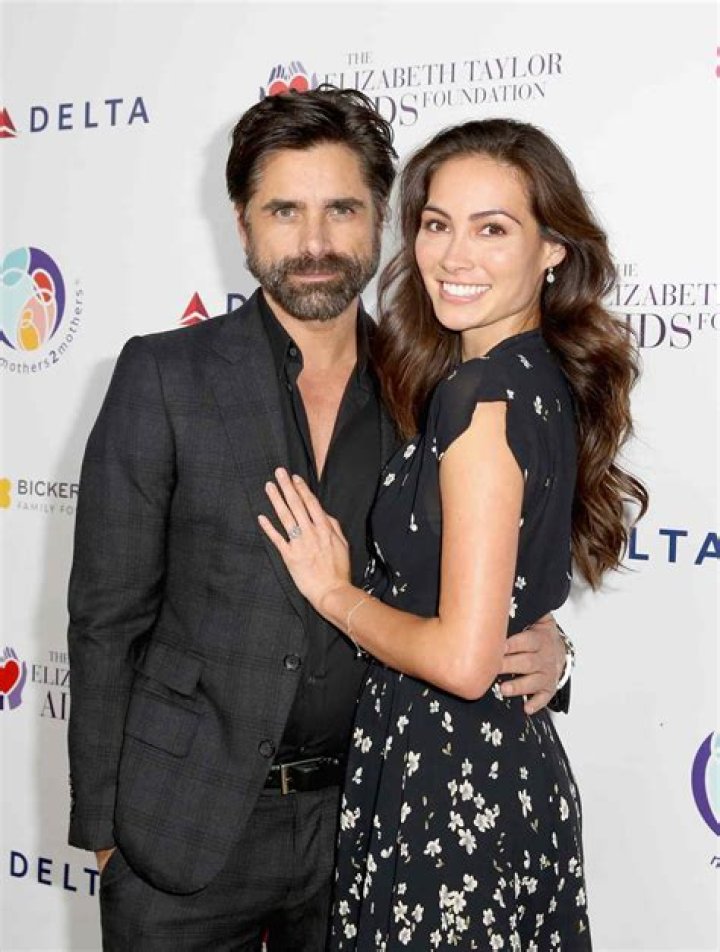 John Stamos and Caitlin McHugh red carpet