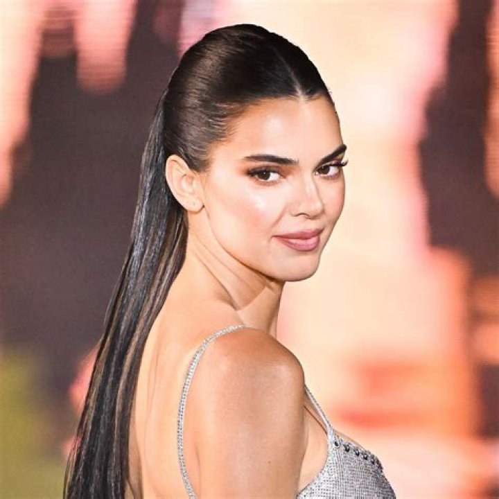 Kendall Jenner in a ponytail, smiling