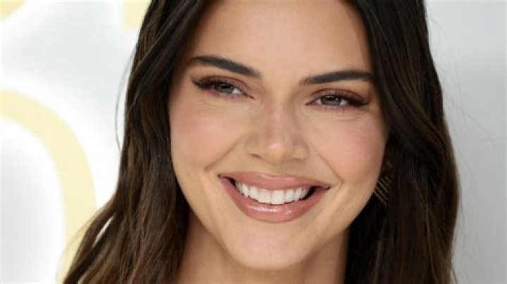 Kendall Jenner smiling wide with her teeth
