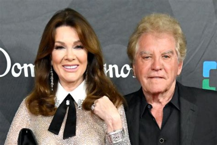 Lisa Vanderpump riding a white horse.