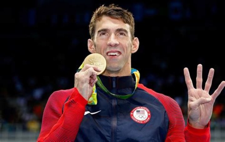 Michael Phelps smiling on the red carpet