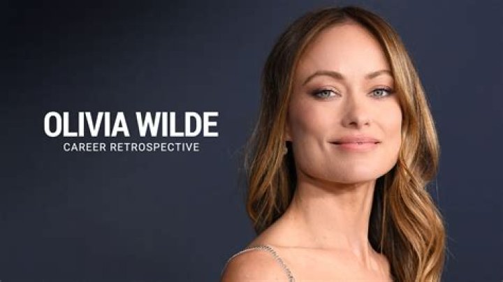 Olivia Wilde posing at an event