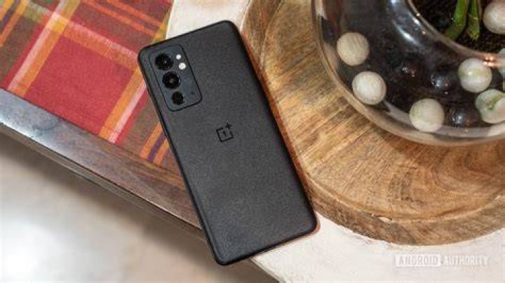 OnePlus 9RT rear panel gleaming under direct light OnePlus 9RT rear panel gleaming under direct light