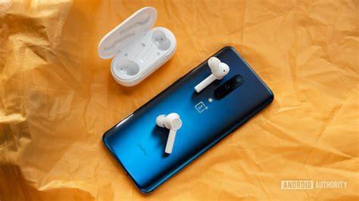 oneplus buds z 3 The OnePlus Buds Z cheap true wireless earbuds on top of a OnePlus 7 Pro smartphone in blue, with the open charging case off to the top left.