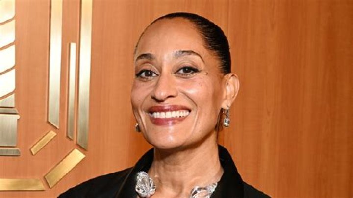 Tracee Ellis Ross using a blow dryer